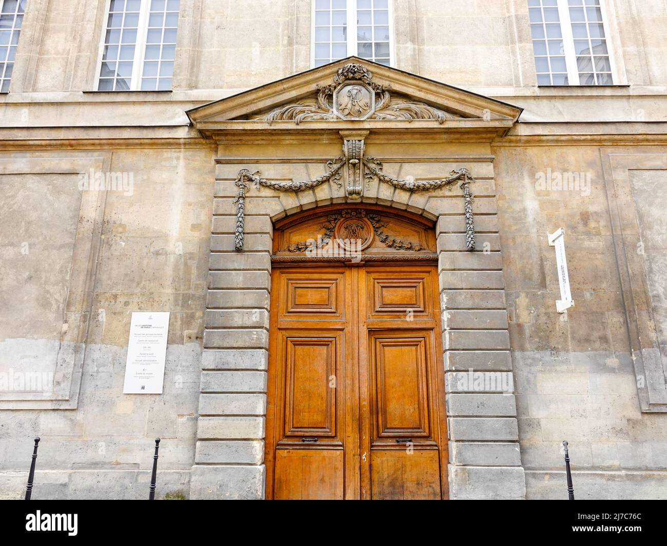 Large double doors on the side of the Museum of the History of Paris, Carvavalet, building, Paris, France. Stock Photo