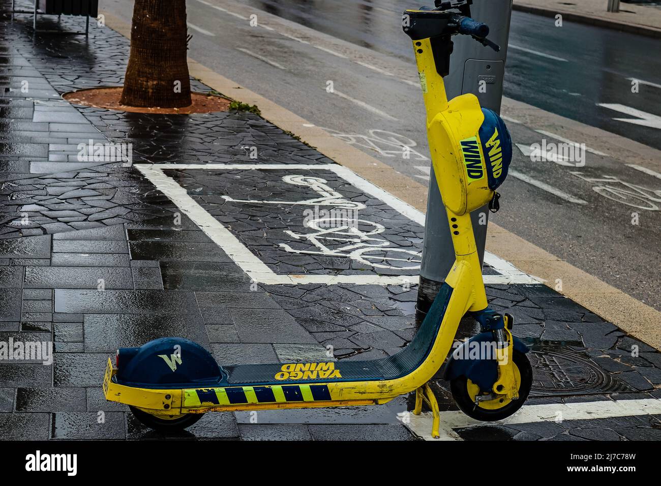 Tel Aviv, Israel - May 07, 2022 Electric scooter to hire, operating with  utility internal combustion engine and a large deck in the center parked in  t Stock Photo - Alamy