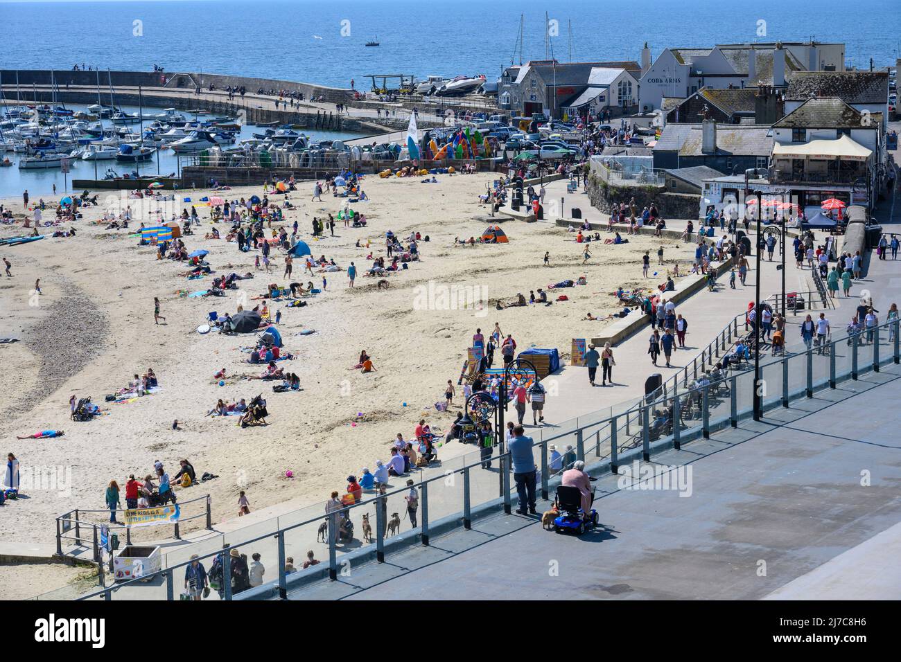 Lyme Regis, Dorset, UK. 8th May 2022. UK Weather Holidaymakers and