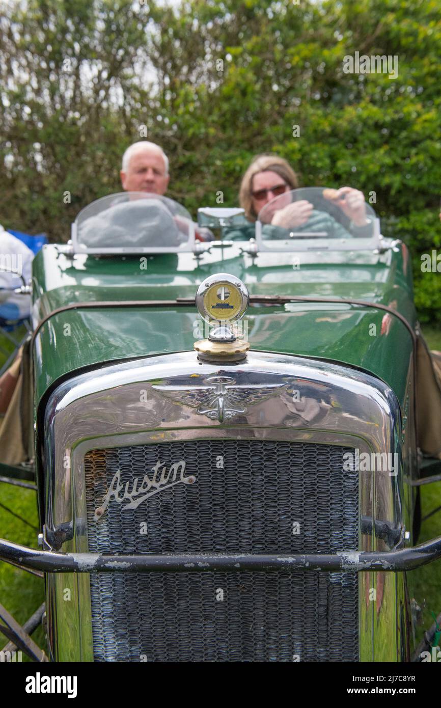 Century of Austin Sevens Celebration, Ambergate, Derbyshire, England, UK. 8th May, 2022. The Pre War Austin 7 car club members taking part in the ‘Century of Sevens Celebration’ hosted by the Great British Car Journey museum. The route, starting and finishing from Ambergate, will travel 38 miles around the beautiful roads and lanes of the  Derbyshire Dales and the Peak district and finishing with a celebration cake at the museum. Credit: Alan Keith Beastall/Alamy Live News Stock Photo