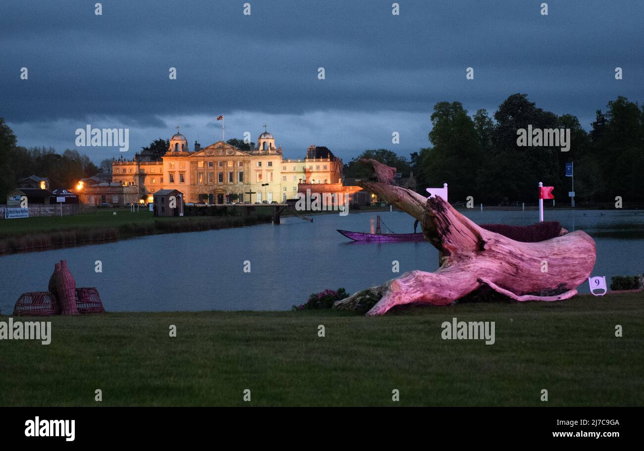 Badminton House and lake illuminated on the eve of the Cross Country Test at the Badminton Horse Trials, UK. 06th May, 2022. Credit: Mark Pain/Alamy Live News Stock Photo