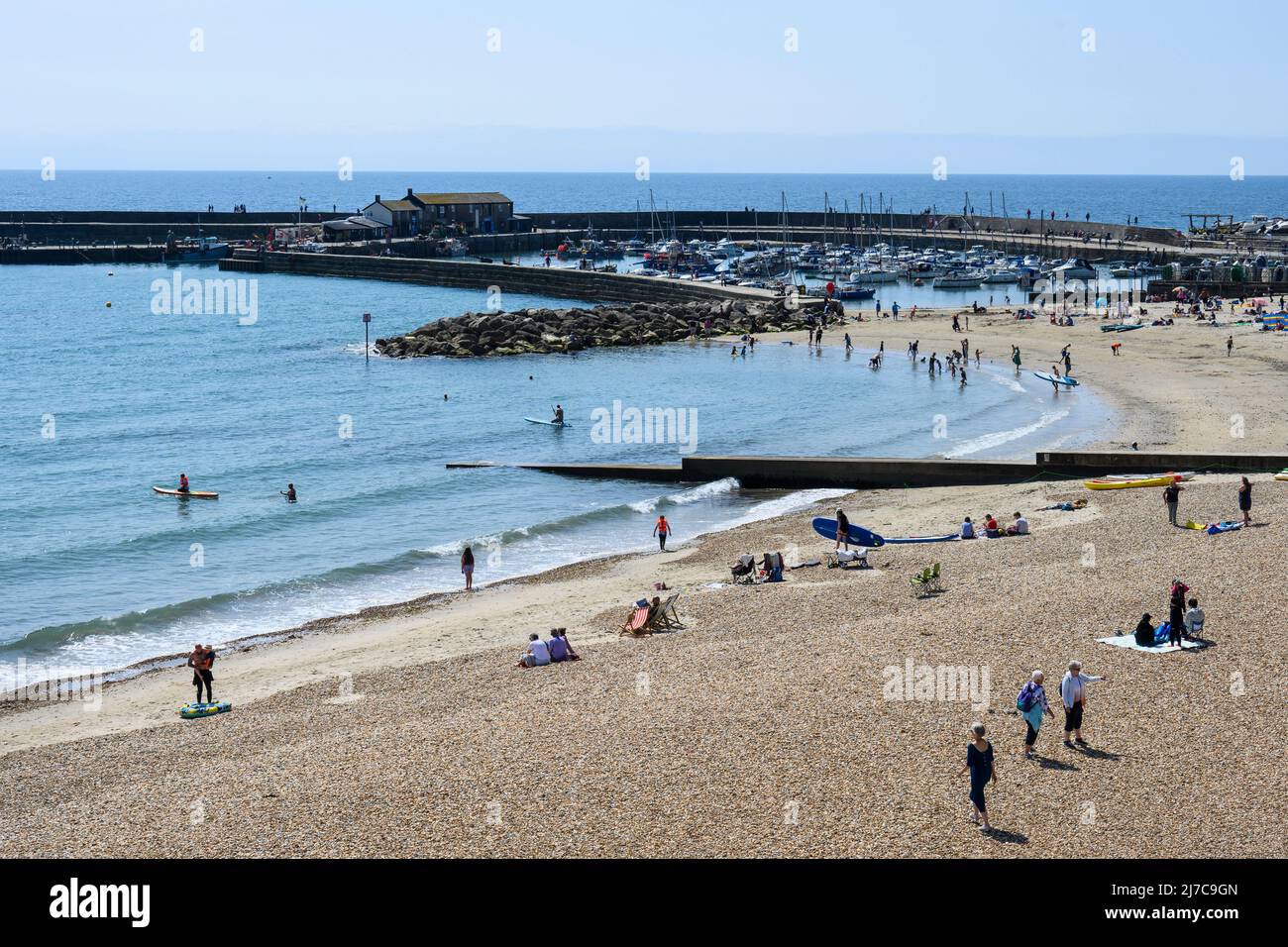 Lyme Regis, Dorset, UK. 8th May 2022. UK Weather Holidaymakers and