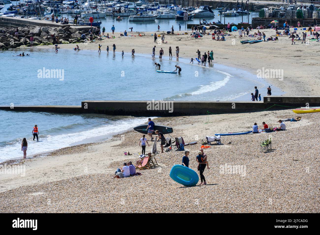 Lyme Regis, Dorset, UK. 8th May 2022. UK Weather Holidaymakers and
