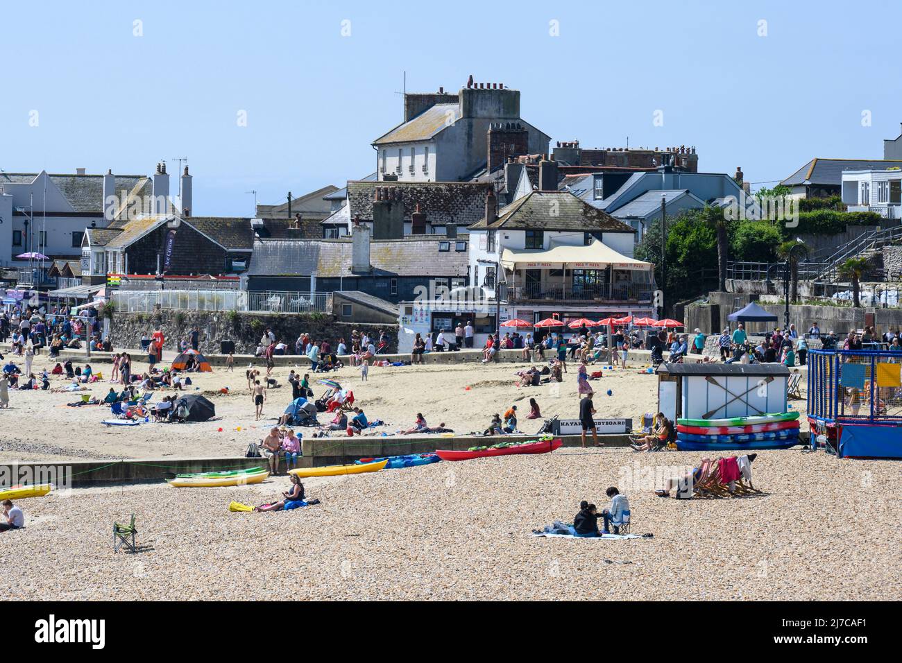 Lyme Regis, Dorset, UK. 8th May 2022. UK Weather Holidaymakers and