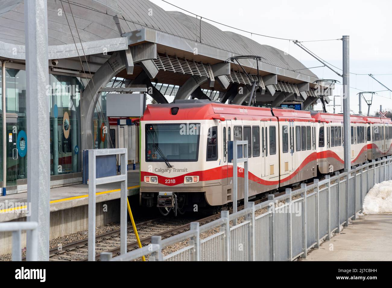 Calgary, AB, Canada - March 14 2022 : CTrain stop by McKnight Westwinds stations platform. CTrain light rail system. Calgary Transit. Stock Photo