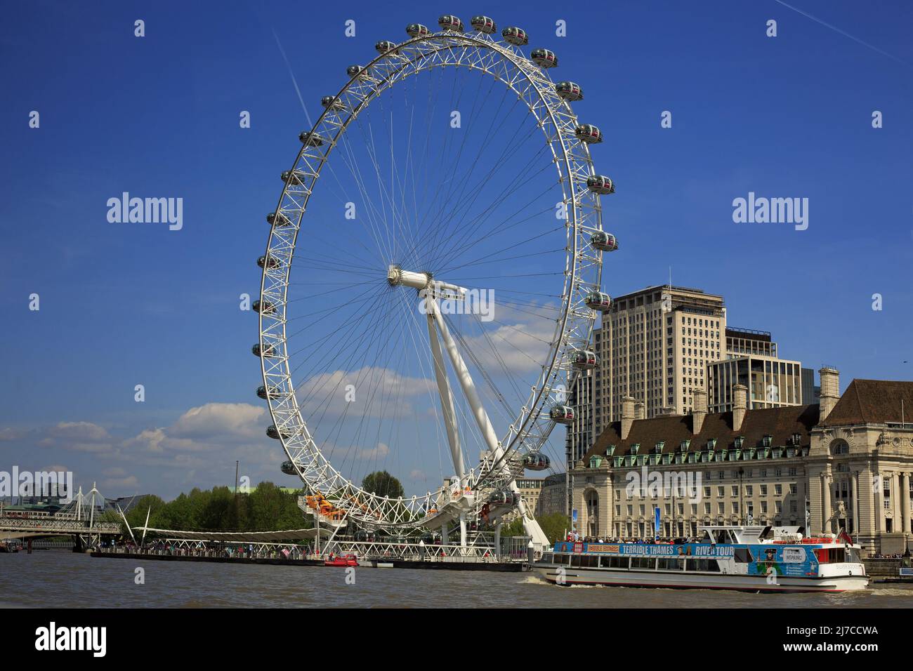 London Eye, Westminster, UK, 2022.  The Millennium Wheel - AKA The London Eye is a major tourist attraction in London, it has 32 pods - each depicts o Stock Photo