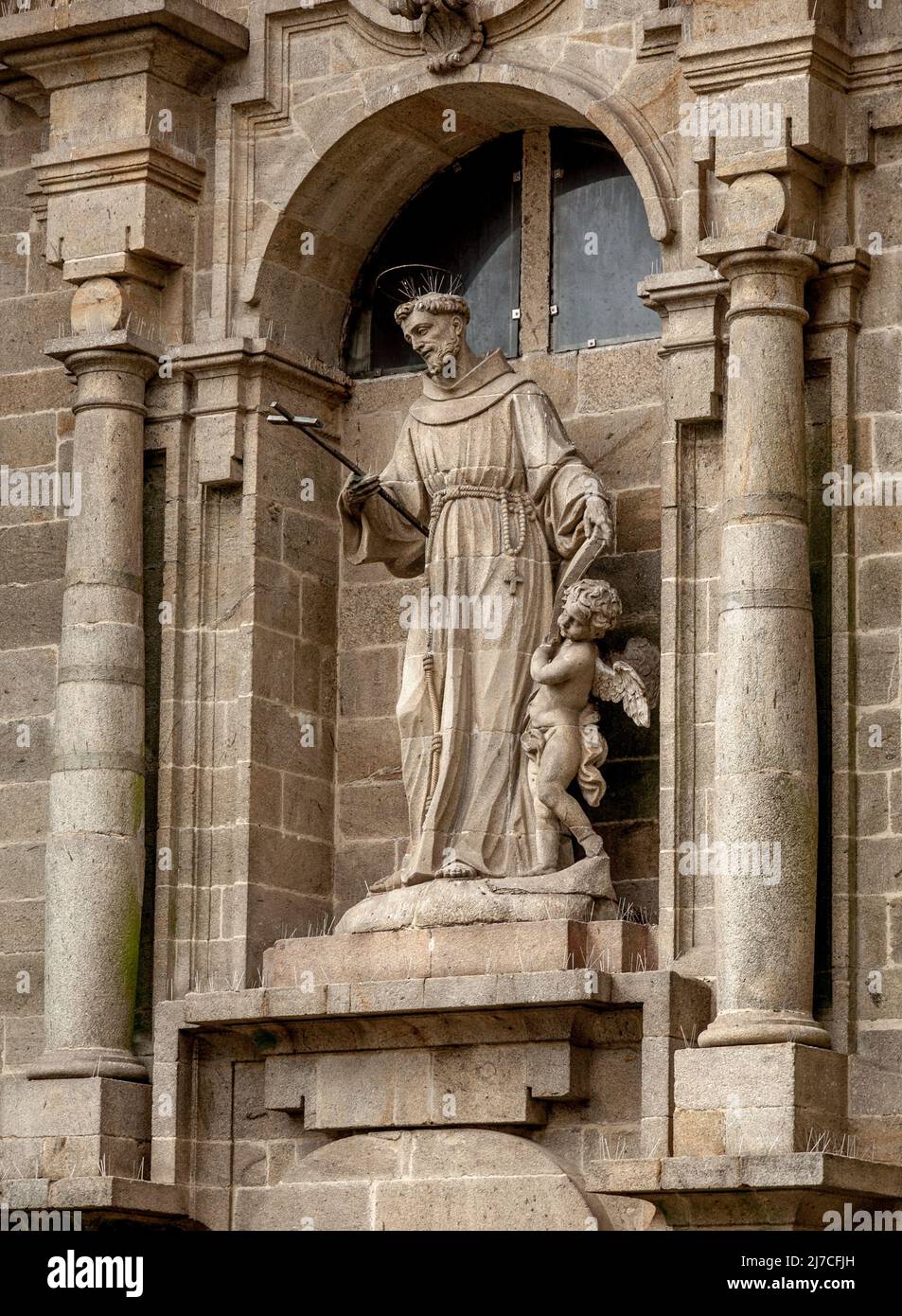 Religious statue on a house in Santiago de Compostela Stock Photo