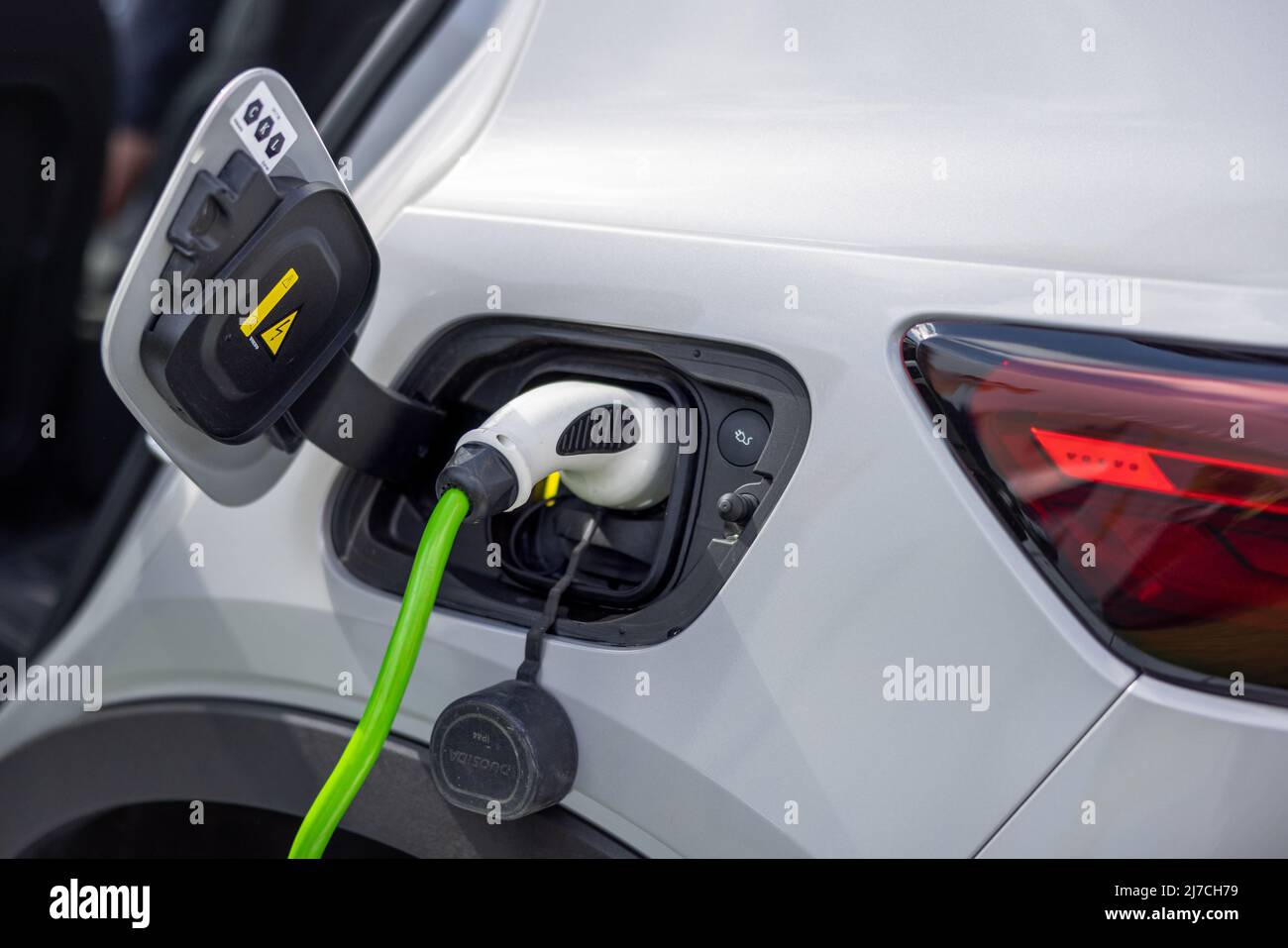 Volvo XC40 Recharge connected to a charging station Stock Photo Alamy