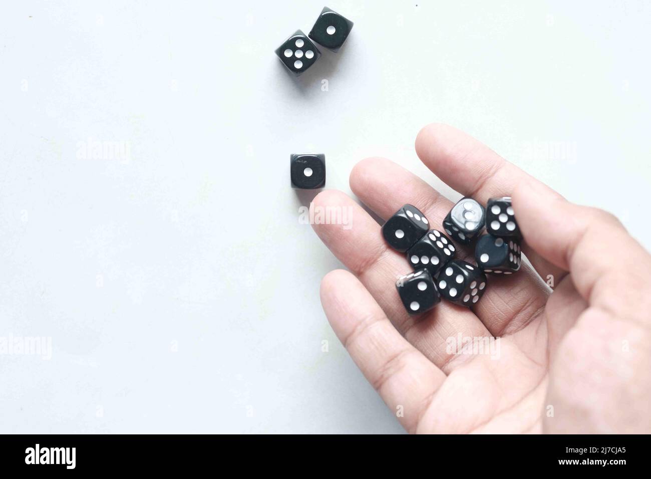 Black Dice trowing on white background top view  Stock Photo