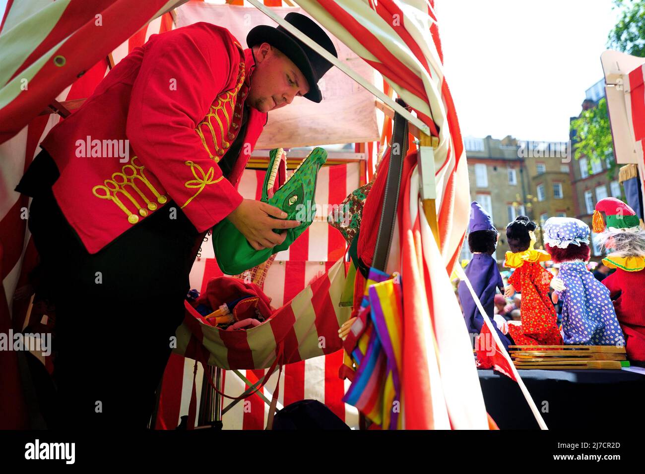 Tommy Bradshaw, known in his show as Professor Bradshaw, packs up his puppets in the back of his