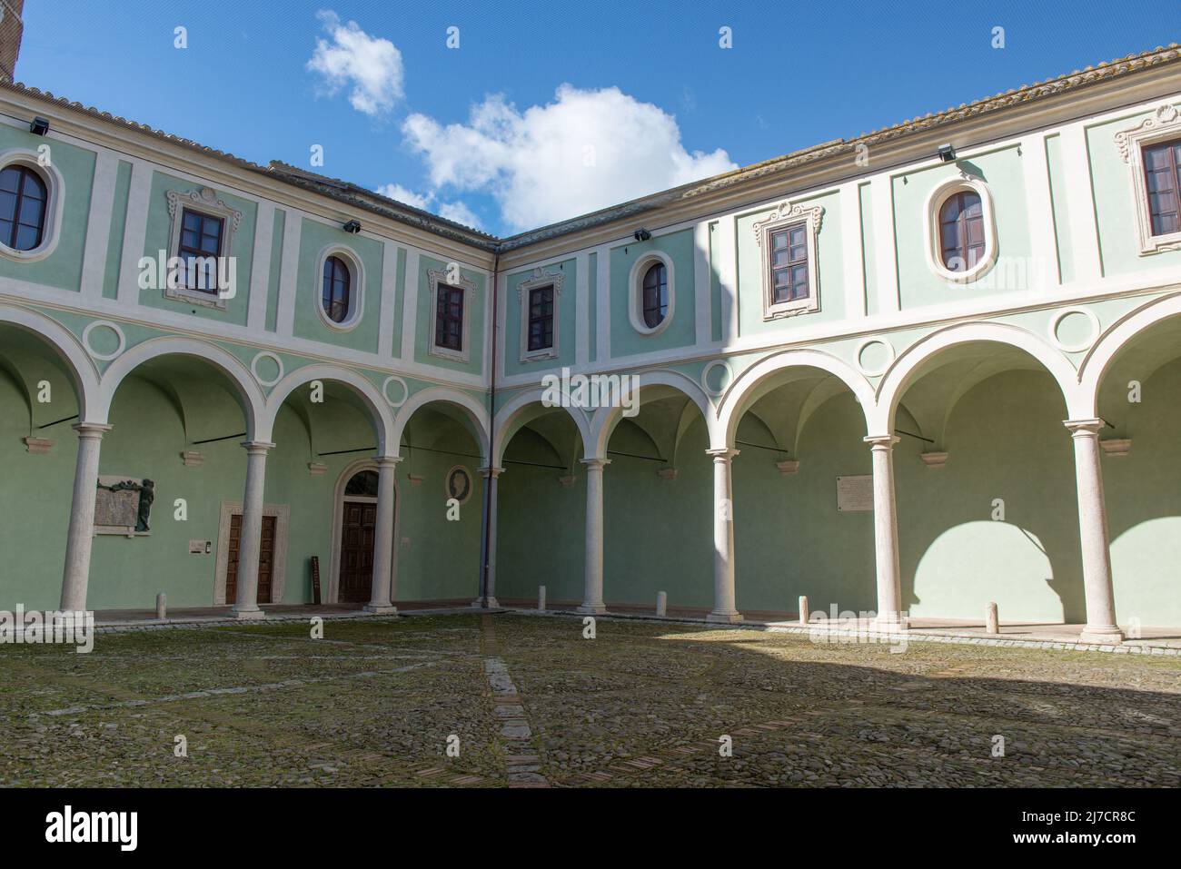 Perugia Italy April 24 2022: The abbey complex of San Pietro has three monumental cloisters. The first, with a sober architectural layout Stock Photo