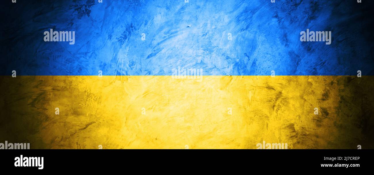 freedom Ukraine flag on dark concreate banner wall background Stock Photo
