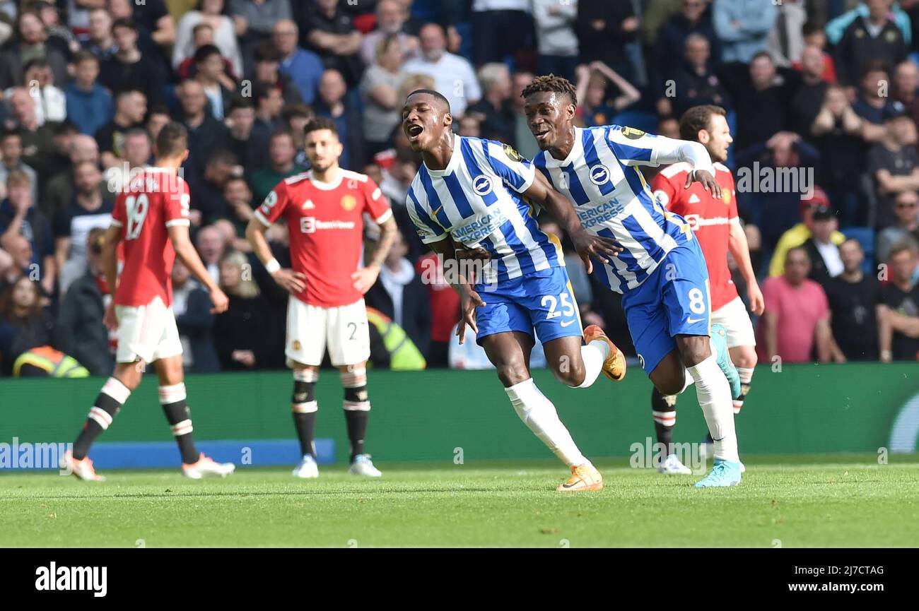 Moises Caicedo of Brighton (left) celebrates with Yves Bissouma after scoring their first goal during  the Premier League match between Brighton and Hove Albion and Manchester United at the American Express Stadium  , Brighton , UK - 7th May 2022  Editorial use only. No merchandising. For Football images FA and Premier League restrictions apply inc. no internet/mobile usage without FAPL license - for details contact Football Dataco Stock Photo