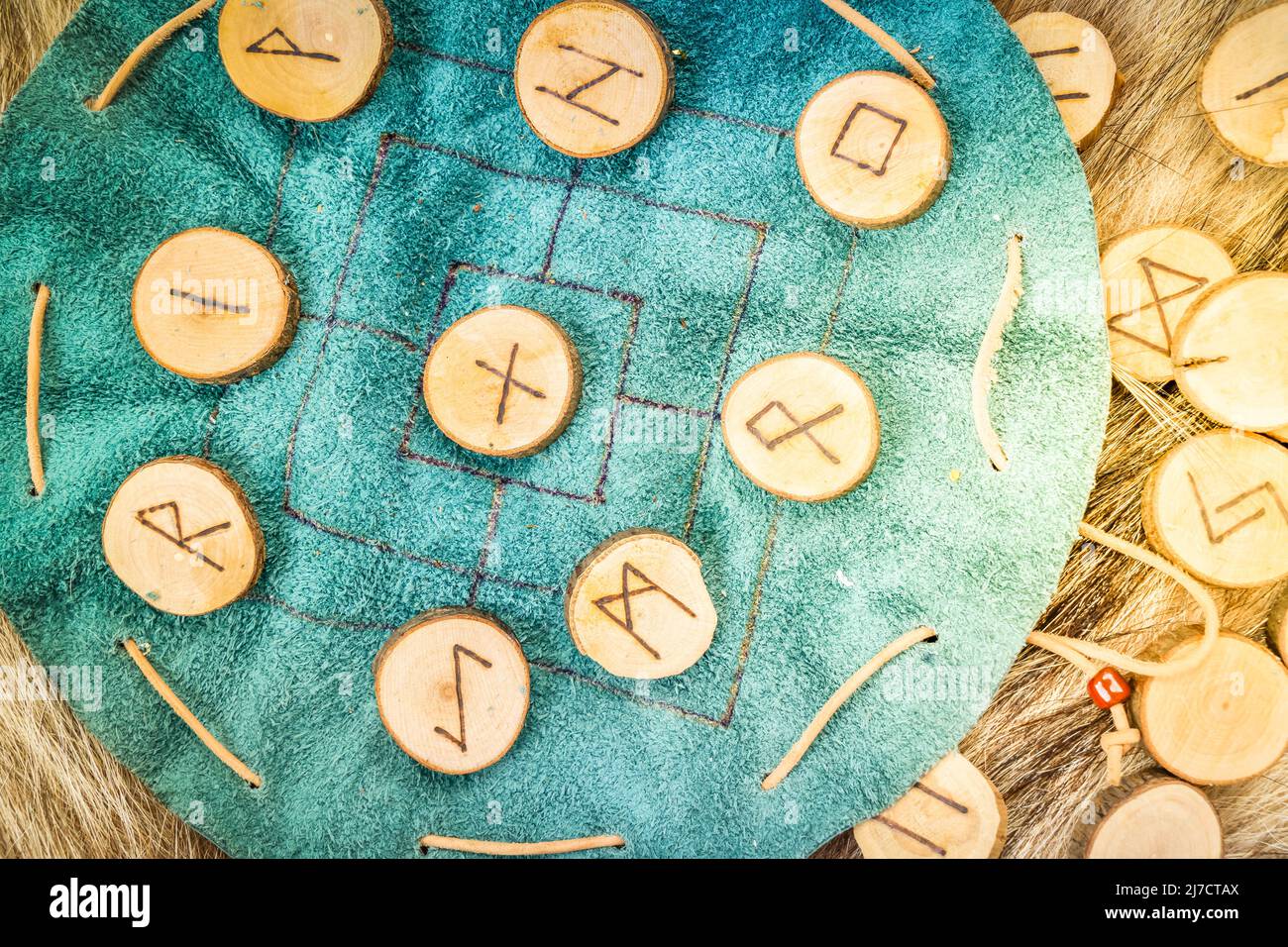 Handmade runes for fortunetelling Stock Photo - Alamy