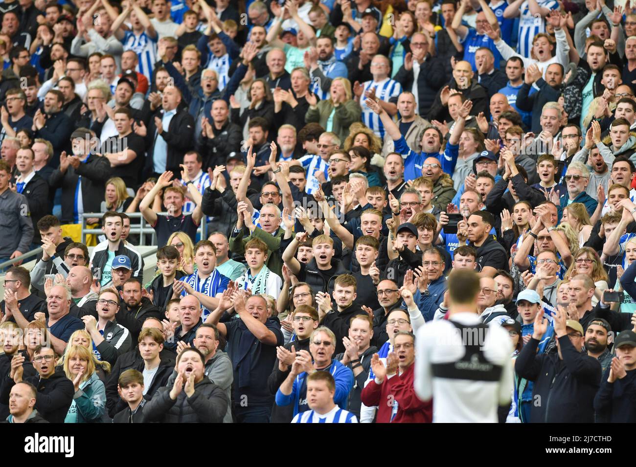 Brighton fans celebrating during  the Premier League match between Brighton and Hove Albion and Manchester United at the American Express Stadium  , Brighton , UK - 7th May 2022  Editorial use only. No merchandising. For Football images FA and Premier League restrictions apply inc. no internet/mobile usage without FAPL license - for details contact Football Dataco Stock Photo