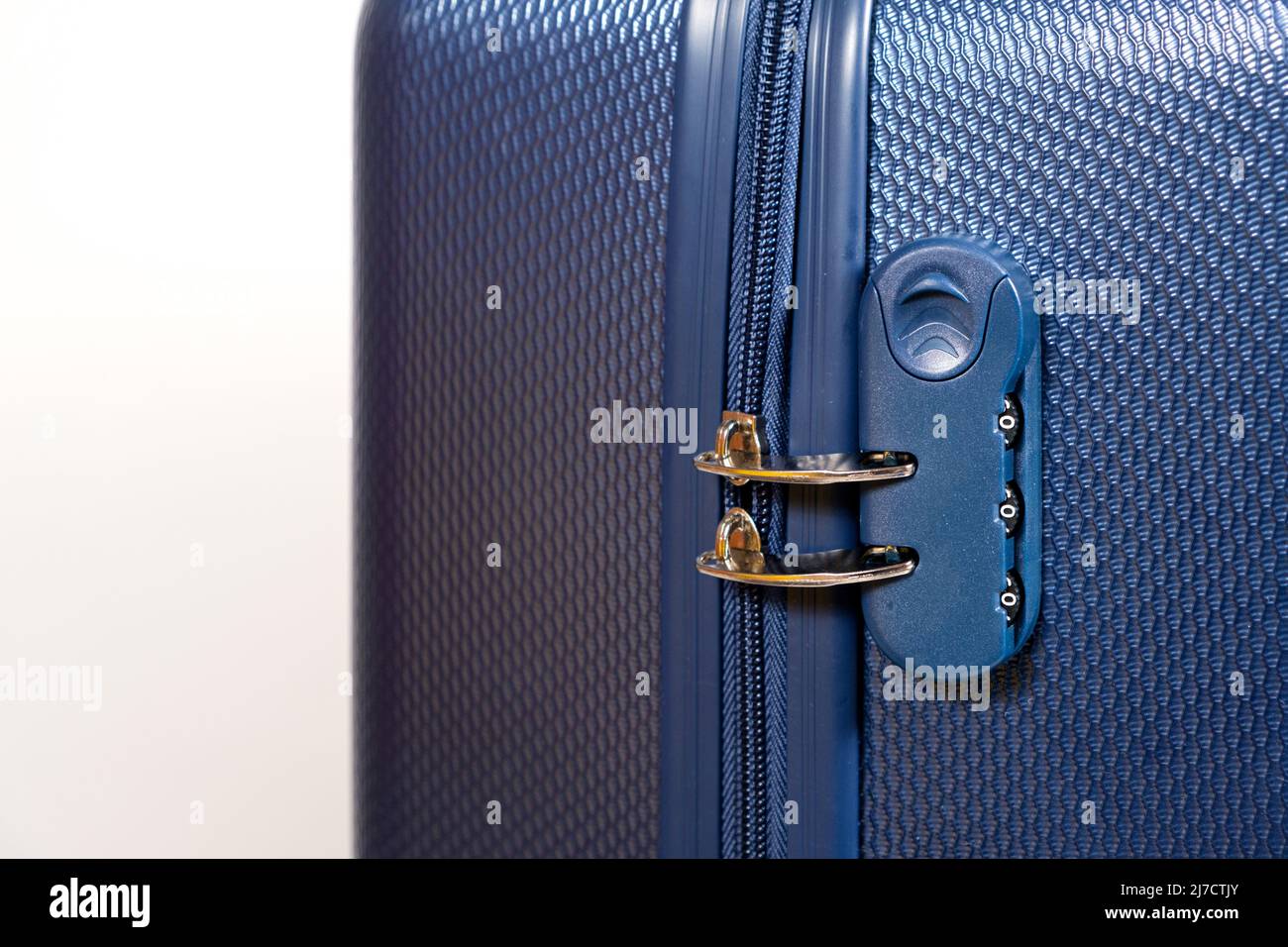 Combination lock for zipper on a suitcase Stock Photo - Alamy