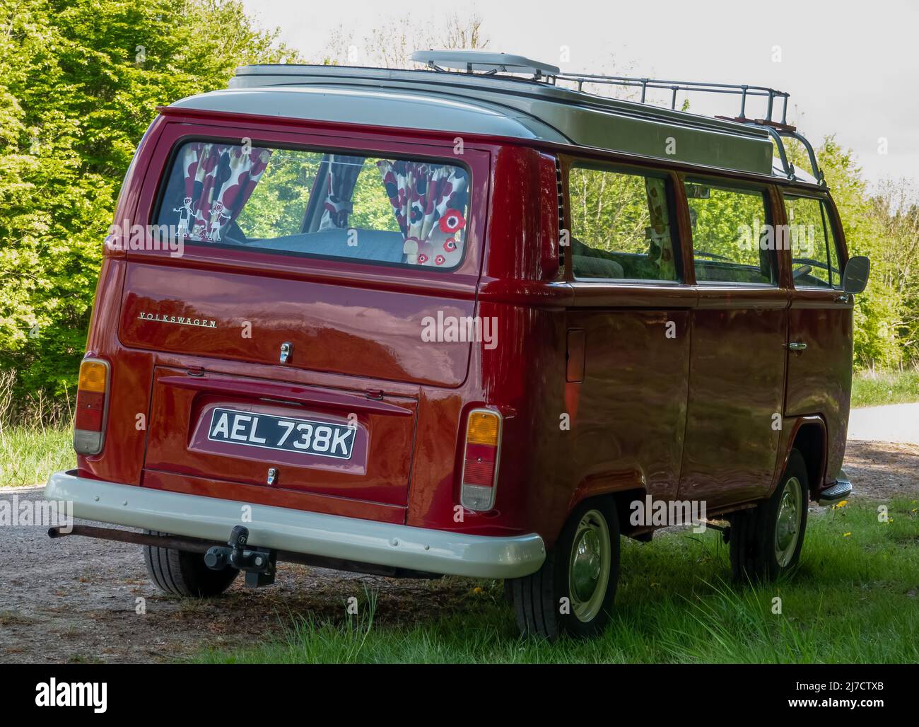VW T2 Devon Campervan AEL 738K, red paint work with white bumpers and hub rims Stock Photo