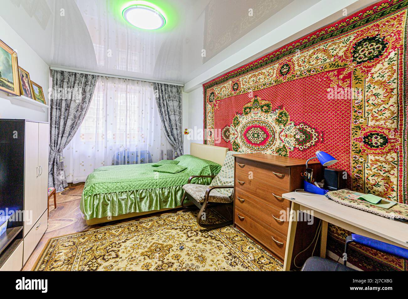 Russia, Moscow- May 21, 2020: interior apartment room bedroom with bed ...
