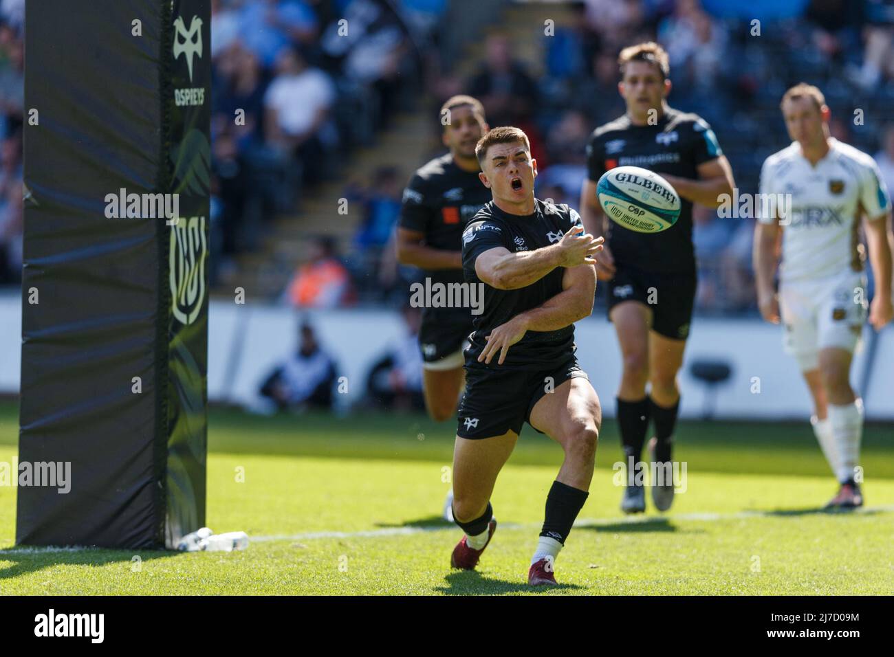 Swansea, UK. 8 May, 2022. Reuben Morgan-Williams of Ospreys celebrates after scoring a try during the Ospreys v Dragons United Rugby Championship Match. Credit: Gruffydd ThomasAlamy Stock Photo