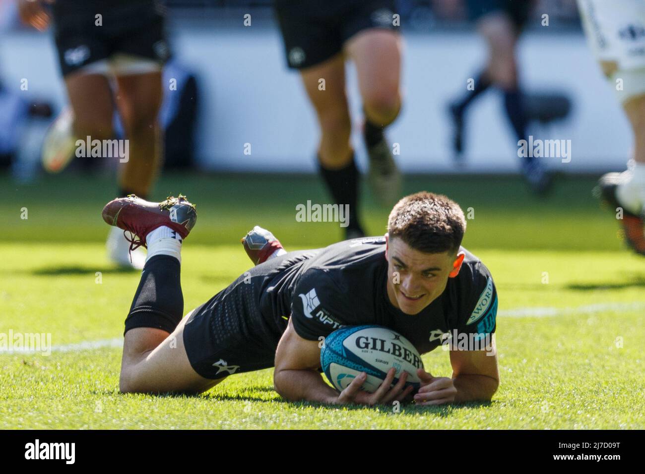 Swansea, UK. 8 May, 2022. Reuben Morgan-Williams of Ospreys scores a try during the Ospreys v Dragons United Rugby Championship Match. Credit: Gruffydd ThomasAlamy Stock Photo