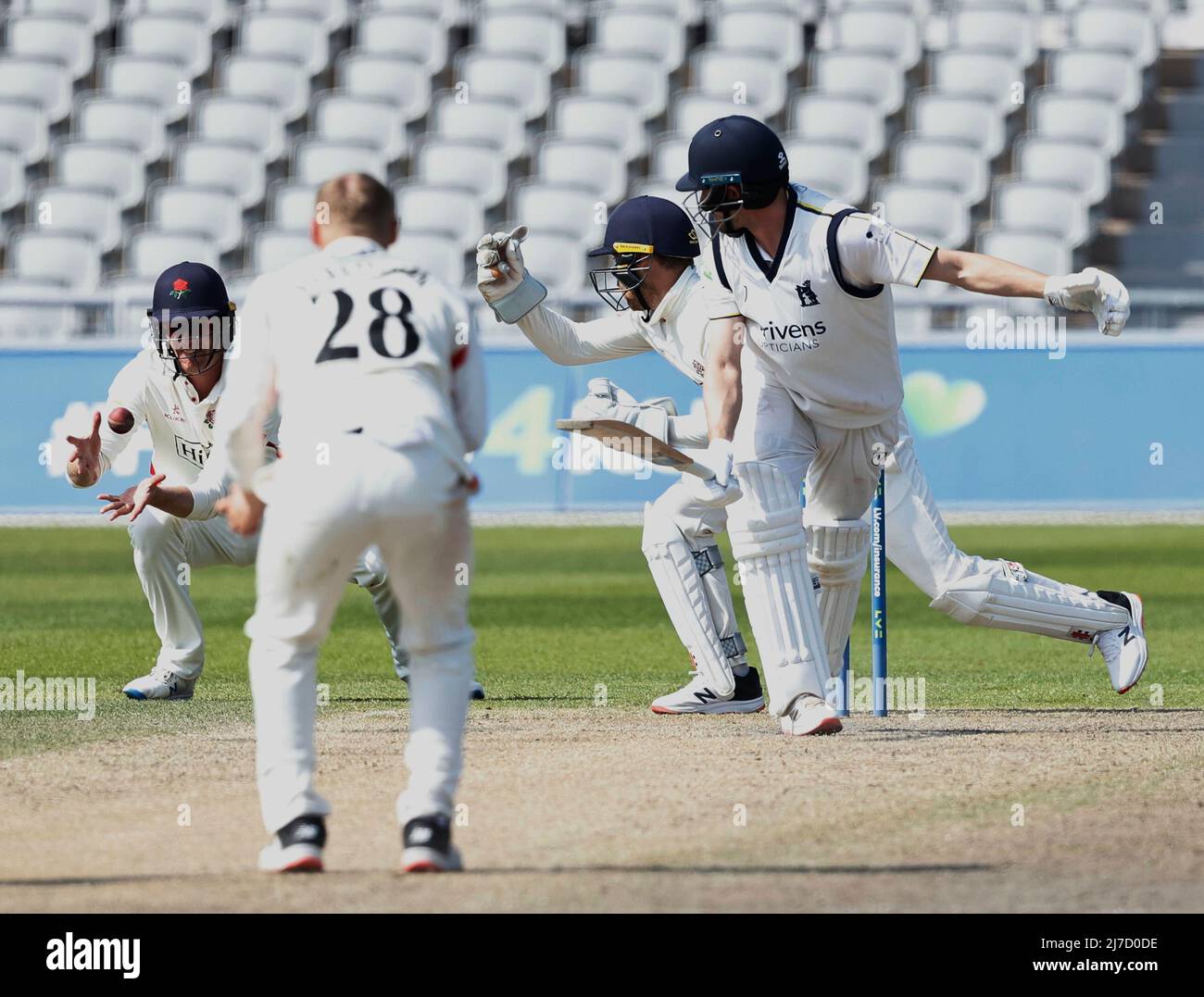 8th May 2022,  Emirates Old Trafford, Manchester, England: LV = County Cricket championship, Lancashire versus Warwickshire: Will Rhodes of Warwickshire nicks the ball into the hands of Keaton Jennings off the bowling of Matt Parkinson and Warwickshire are 136-5 Stock Photo