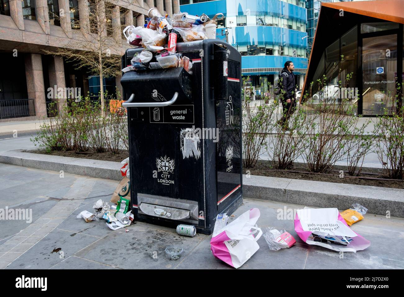 Overflowing public litter bin in the City of London, UK Stock Photo