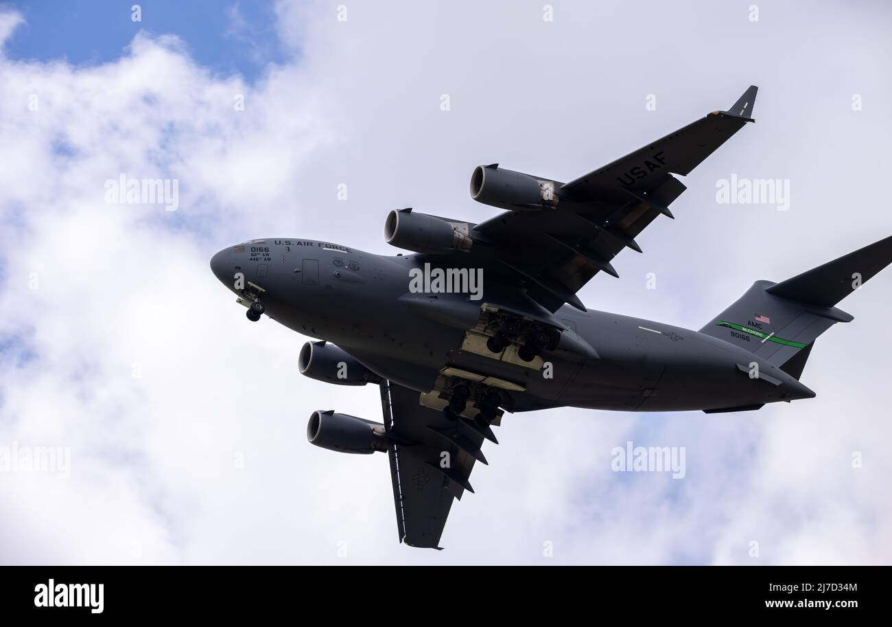 SAN ANTONIO, TEXAS - 04.23.2022 - USA Air Force Boeing C-17 Globemaster III military cargo plane in flight. Aircraft of the 62nd Airlift Wing. Stock Photo