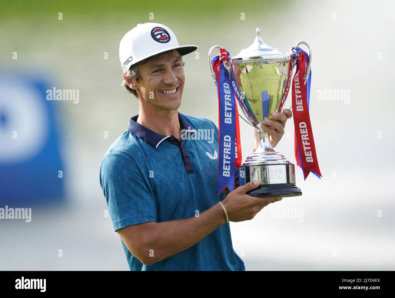 Denmark's Thorbjorn Olesen celebrates winning with the trophy after day four of Betfred British Masters at The Belfry, Sutton Coldfield. Picture date: Sunday May 8, 2022. Stock Photo