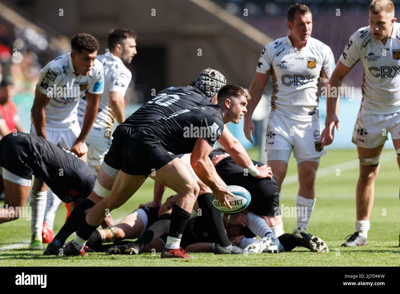 Swansea, UK. 8 May, 2022. Reuben Morgan-Williams of Ospreys passes the ball during the Ospreys v Dragons United Rugby Championship Match. Credit: Gruffydd ThomasAlamy Stock Photo