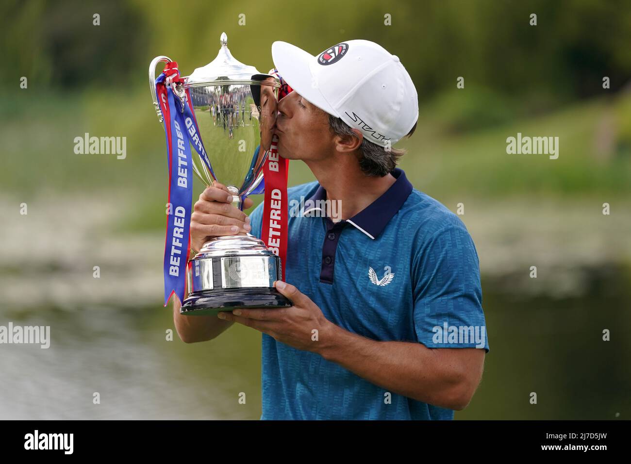 Denmark's Thorbjorn Olesen celebrates winning with the trophy after day four of Betfred British Masters at The Belfry, Sutton Coldfield. Picture date: Sunday May 8, 2022. Stock Photo