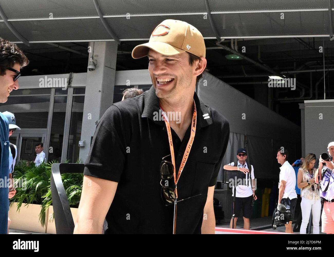 8th May 2022; Miami, Florida, USA; Ashton Kutcher tours the paddock with  his children prior to the start of the Formula 1 CRYPTO.COM Miami Grand  Prix Stock Photo - Alamy