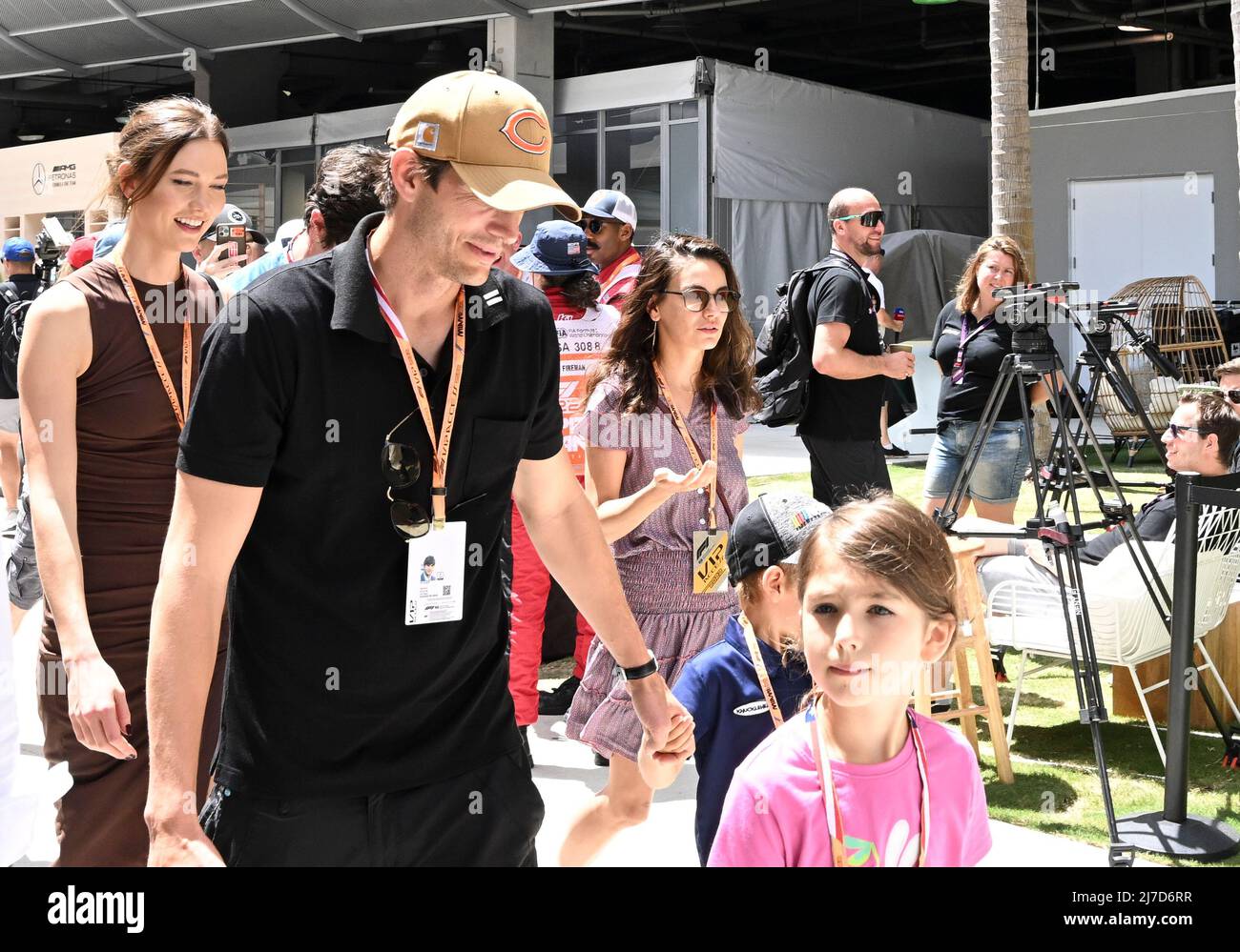 8th May 2022; Miami, Florida, USA;  Ashton Kutcher and Mila Kunos (right) tour the paddock with their children and actress Karlie Kloss prior to the start of the Formula 1 CRYPTO.COM Miami Grand Prix Stock Photo