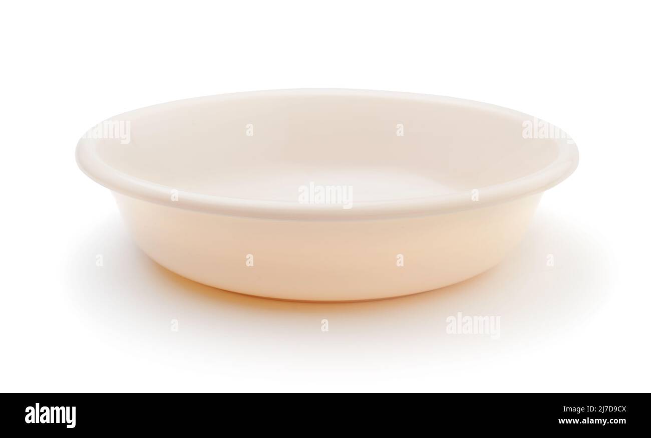 Beige plastic plate isolated on white. Stock Photo