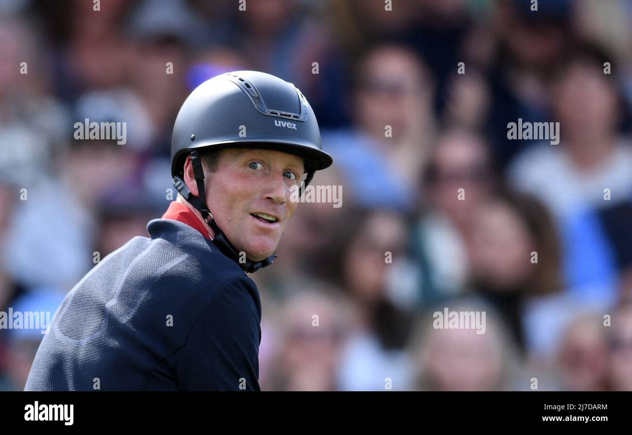8th May 2022, Badminton Estate, Gloucestershire, England; Mars Equestrian Badminton Horse Trials, day 5;  Oliver Townend riding SWALLOW SPRINGS checks the scoreboard after his ride to see he will not win Badminton 2022 Stock Photo