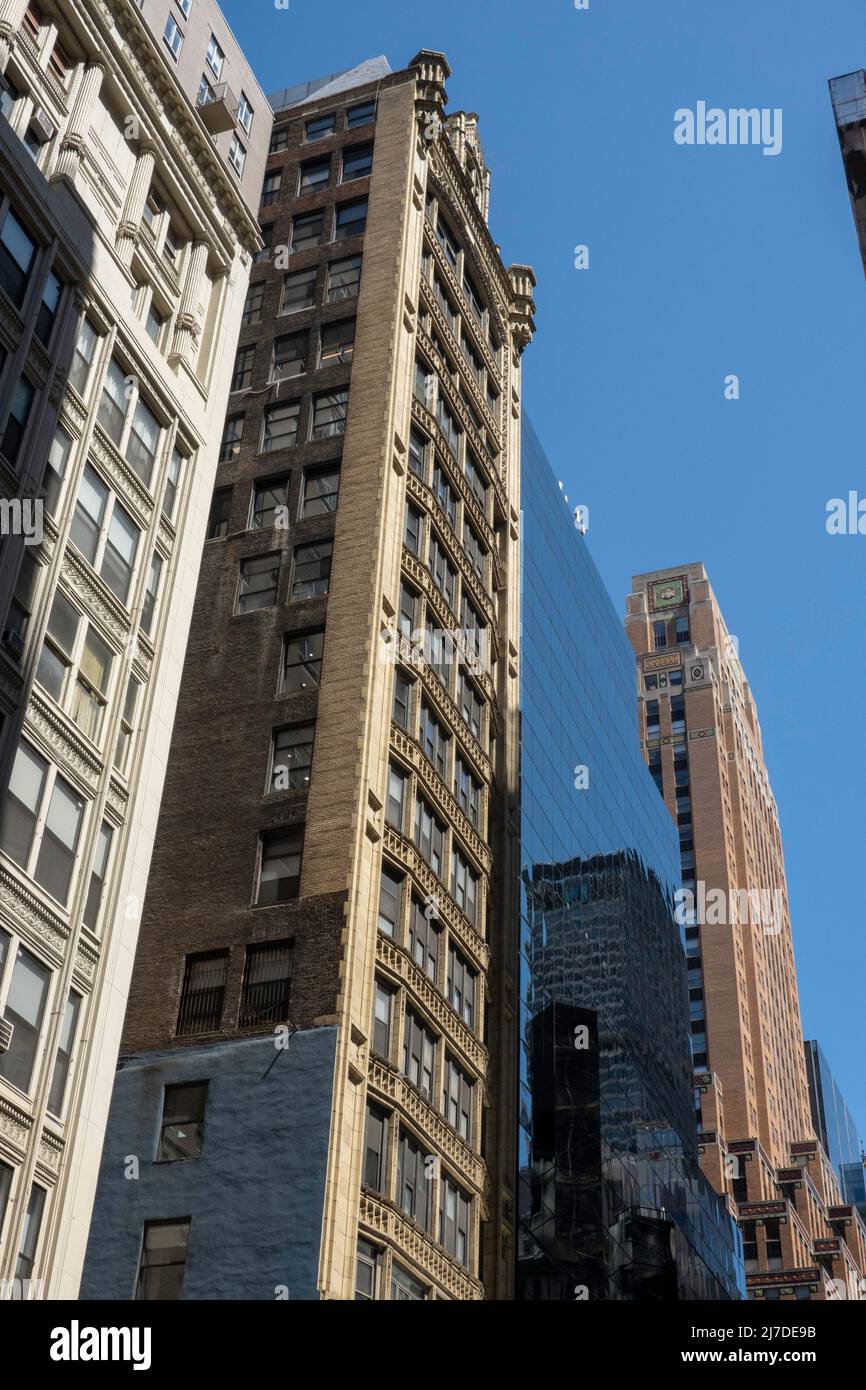 The Fred F French Building and other  Skyscrapes  on West 45th Street at Fifth Avenue in Midtown Manhattan, 2022, NYC, USA Stock Photo