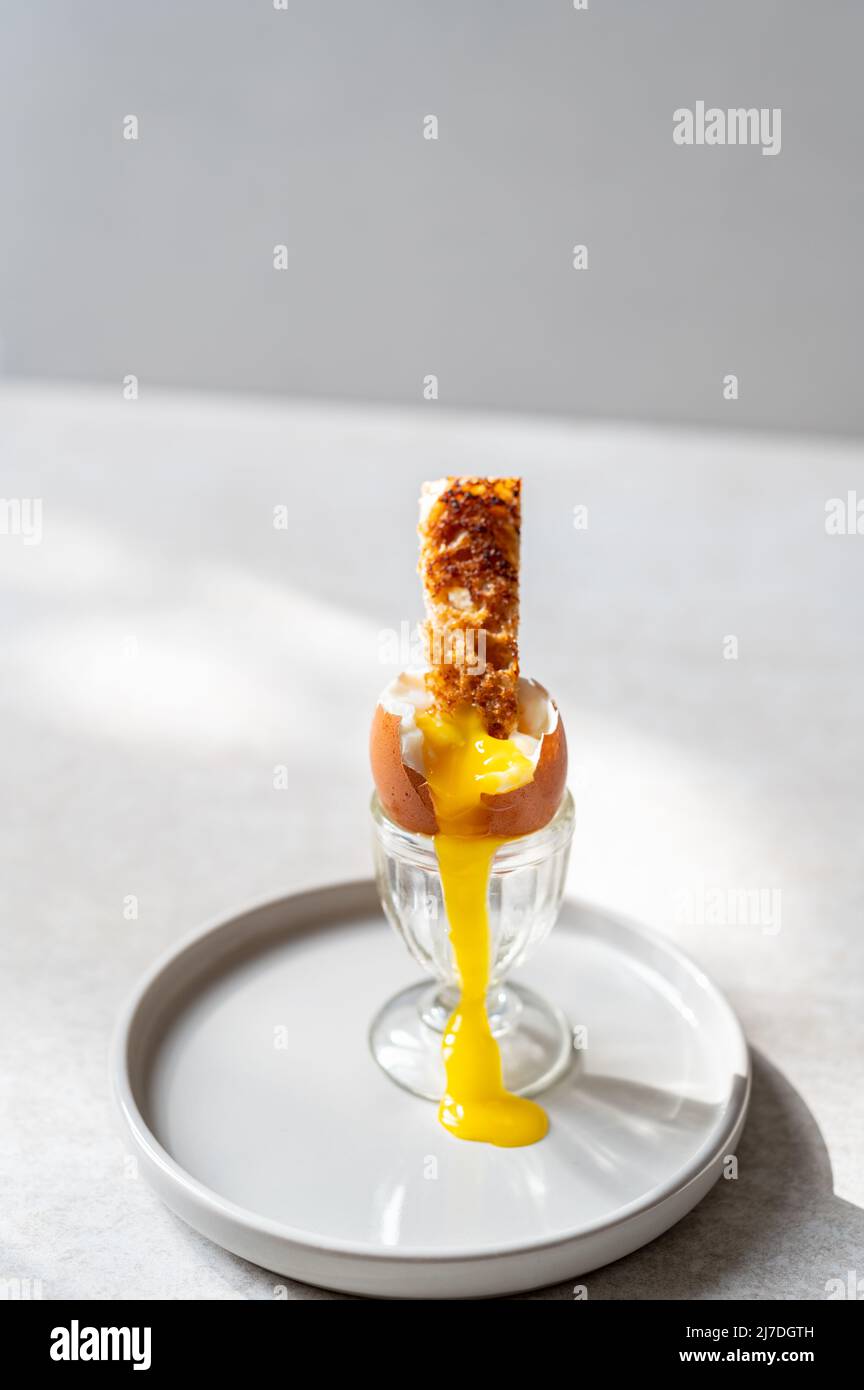 Soft boiled egg with bread stick Stock Photo