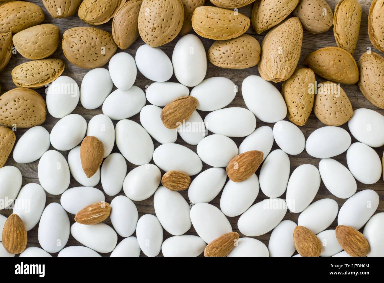 Traditional, white colored, chocolate covered almond candies with