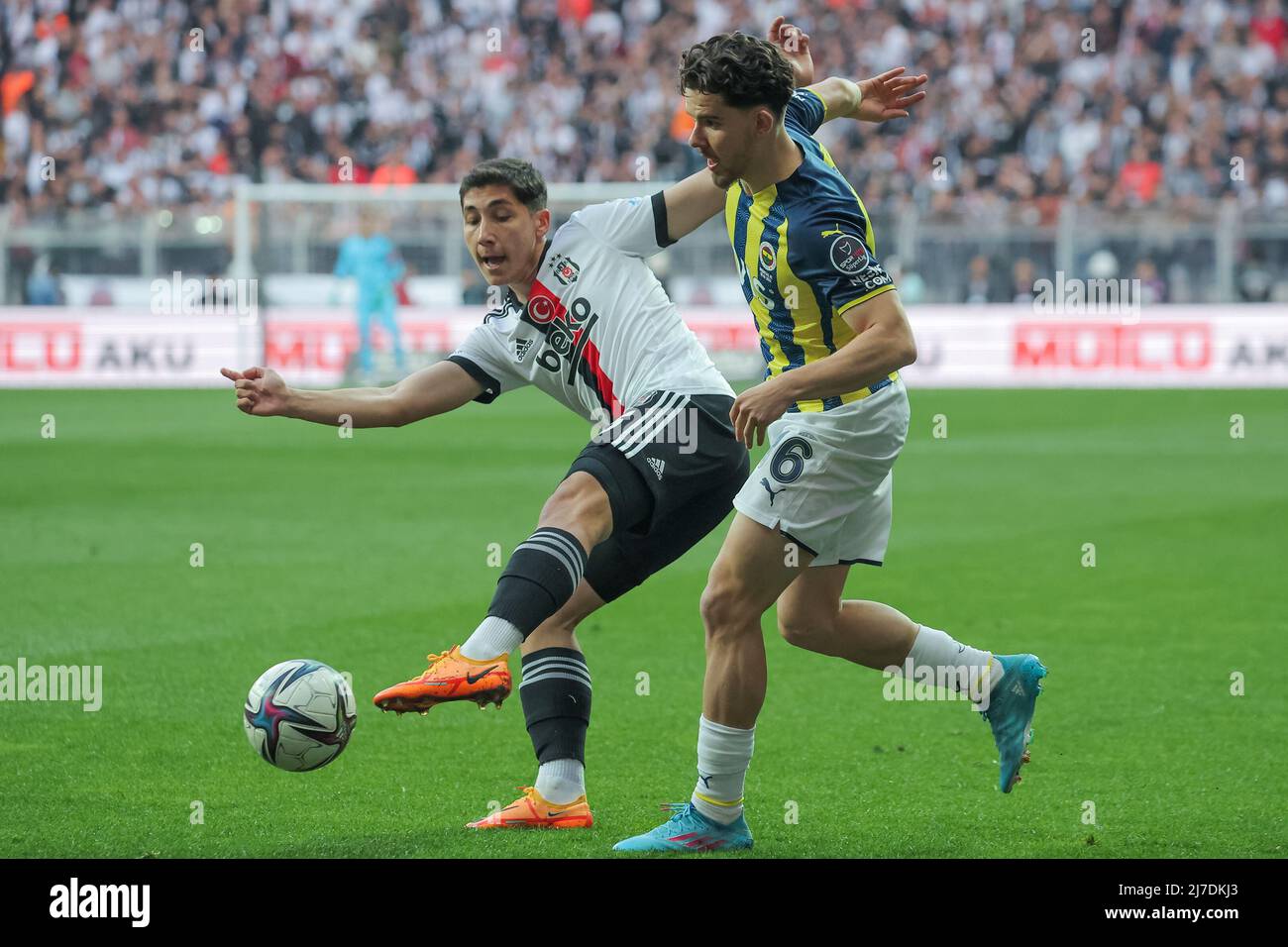 ISTANBUL, TURKEY - MAY 8: Emirhan İlkhan of Besiktas JK and Ferdi Kadıoglu  of Fenerbahce SK battle for possession during the Turkish Super Lig match  between Besiktas JK and Fenerbahce SK at