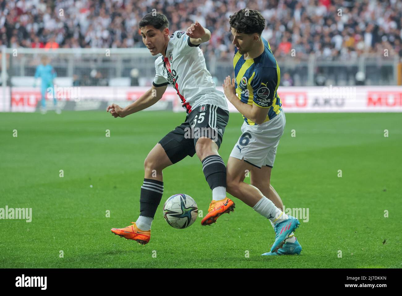 ISTANBUL, TURKEY - MAY 8: Emirhan İlkhan of Besiktas JK and Ferdi Kadıoglu  of Fenerbahce SK battle for possession during the Turkish Super Lig match  between Besiktas JK and Fenerbahce SK at