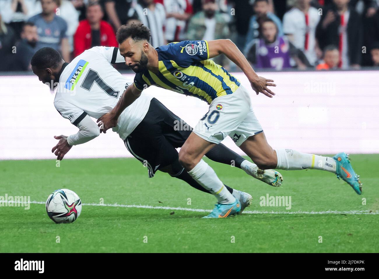 ISTANBUL, TURKEY - MAY 8: Georges-Kevin N'Koudou of Besiktas JK and Nazım Sangare of Fenerbahce SK battle for possession during the Turkish Super Lig match between Besiktas JK and Fenerbahce SK at Vodafone Park on May 8, 2022 in Istanbul, Turkey (Photo by Orange Pictures) Stock Photo