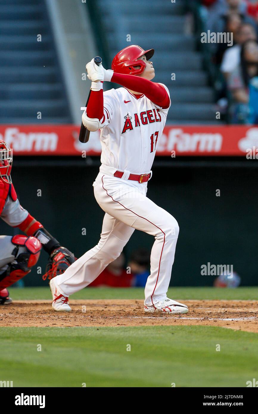 Los Angeles Angels designated hitter Shohei Ohtani (17) hits the ball during an MLB regular season game against the Washington Nationals, Saturday, Ma Stock Photo