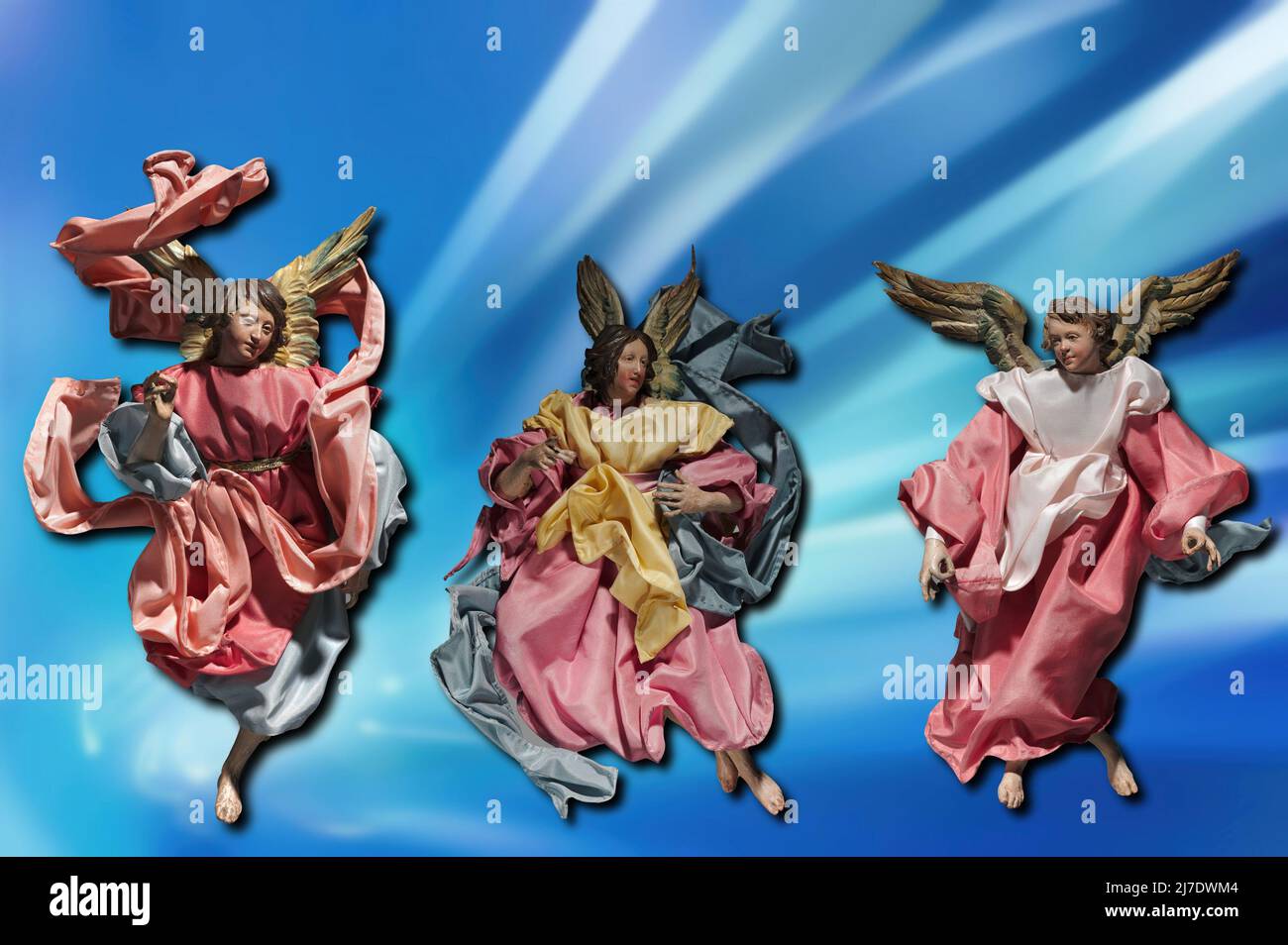 Statuettes depicting angels in painted wood and terracotta with various fabrics, produced in Naples (Italy) in 1800. Stock Photo