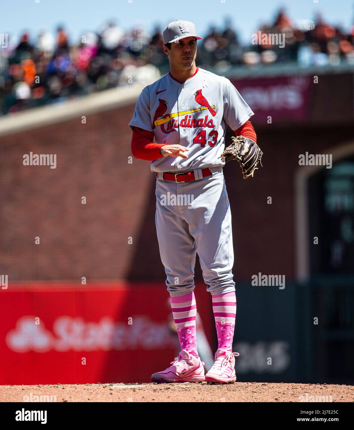 New St. Louis Cardinals starting pitcher John Smoltz delivers a pitch