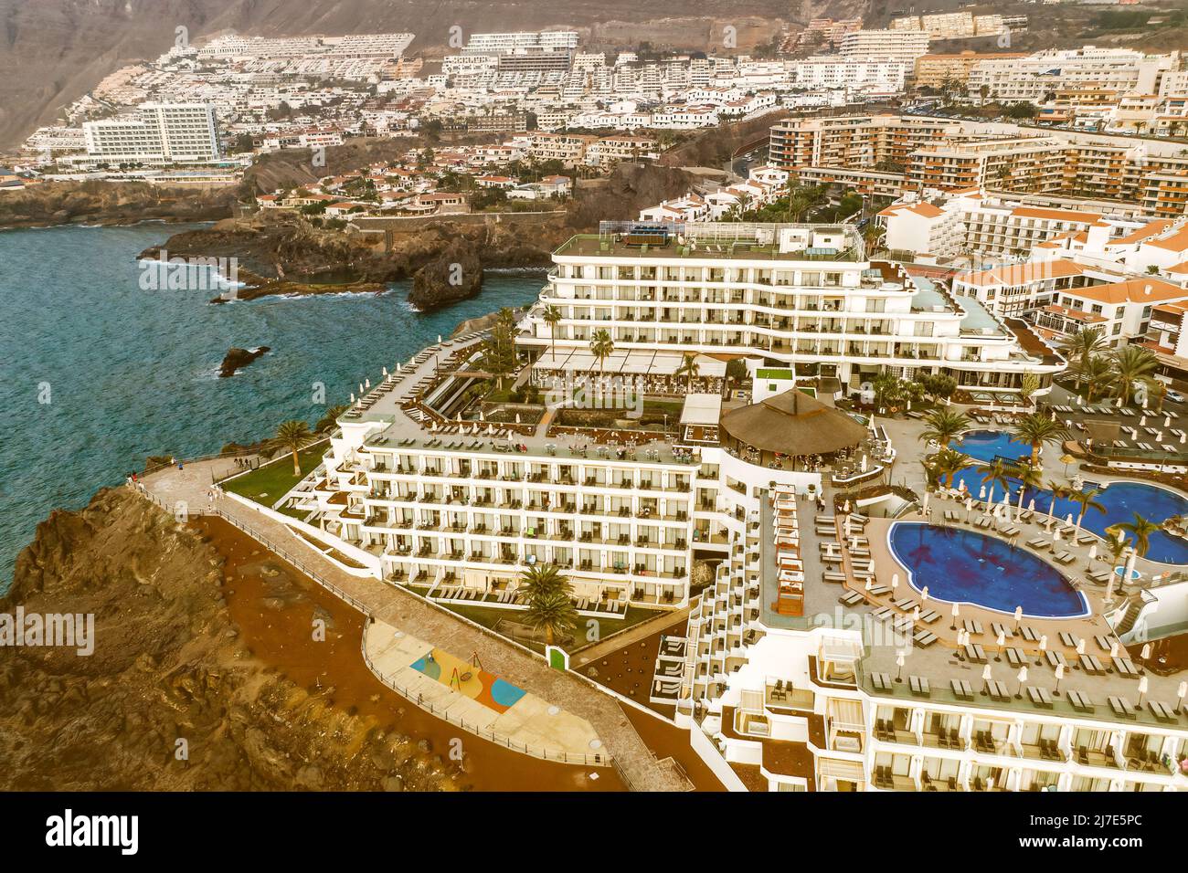 Hotel complex on a rocky shore of Tenerife, Canary island, Spain Stock Photo