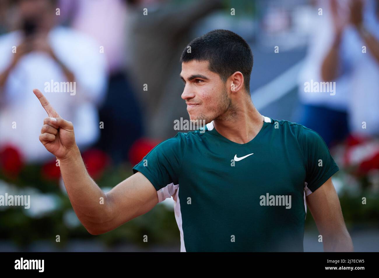 MADRID, May 9, 2022 (Xinhua) -- Carlos Alcaraz of Spain celebrates after the men's singles final against Alexander Zverev of Germany at the Madrid Open in Madrid, Spain, May 8, 2022. (Xinhua/Meng Dingbo) Stock Photo