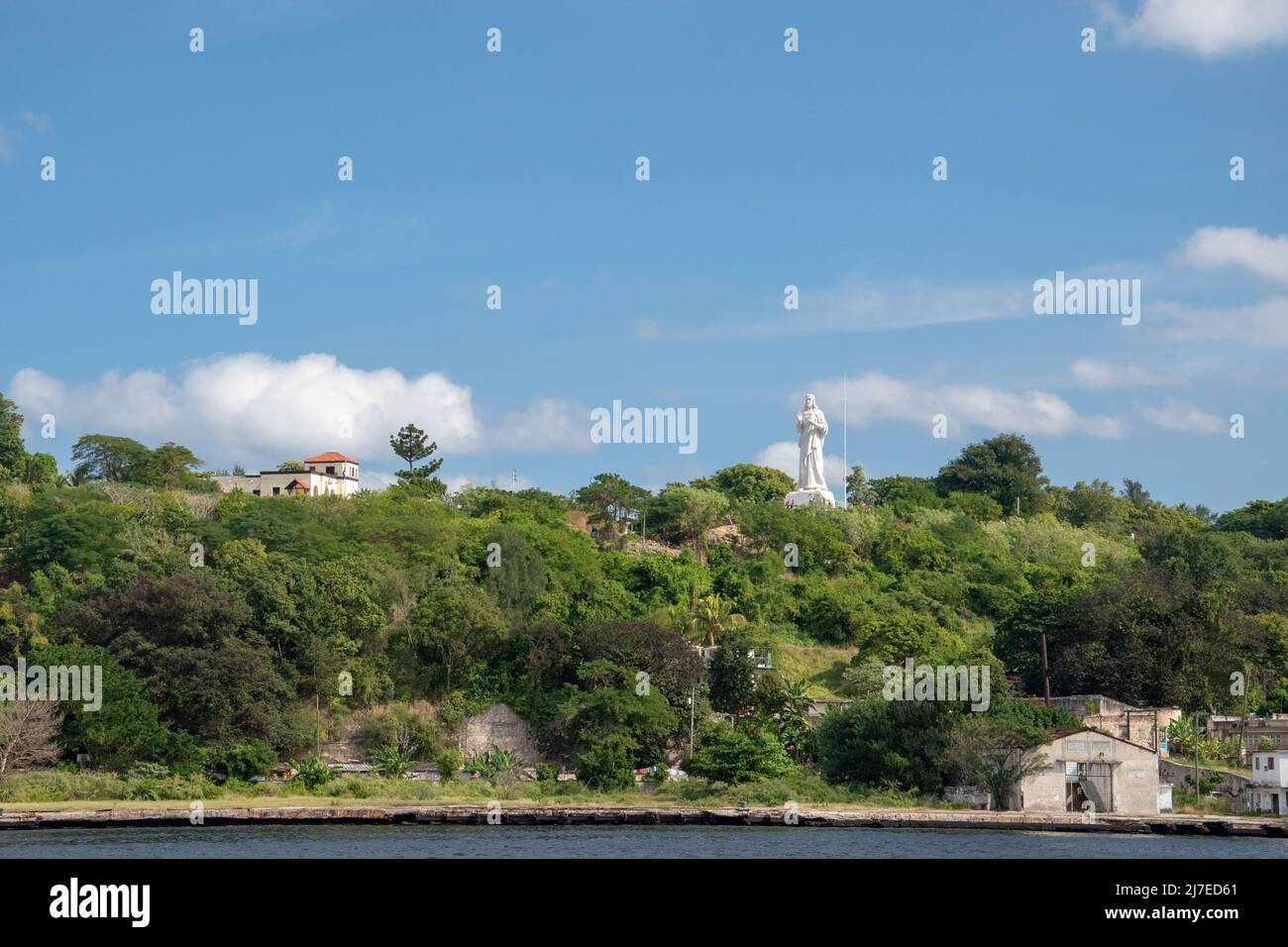 The Christ of Havana (Cristo de La Habana) is a large sculpture representing Jesus of Nazareth, on a hilltop overlooking the bay in Havana, Cuba Stock Photo