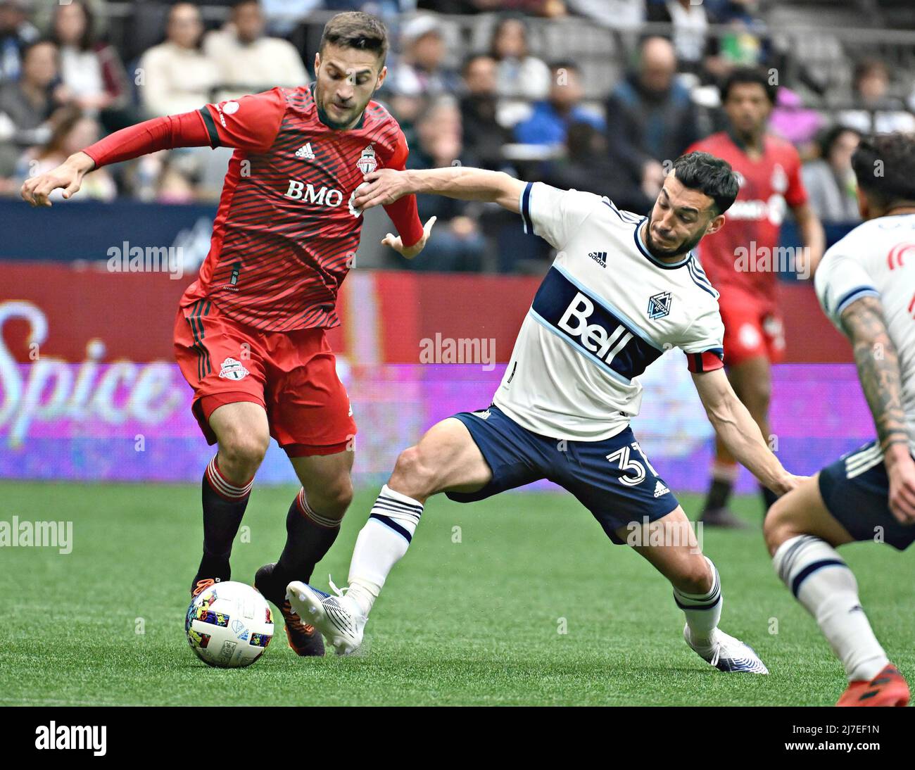 VANCOUVER, May 9, 2022 (Xinhua) -- Jesus Jiminez (L) of Toronto FC and Russell Tiebert of Vancouver Whitecaps compete during their MLS regular season football match in Vancouver, Canada, May 8, 2022. (Photo by Andrew Soong/Xinhua) Stock Photo