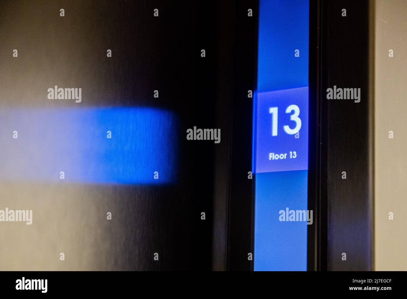 28 April 2022, Berlin: A display shows the 13th floor in an elevator. (Posed scene) Photo: Christoph Soeder/dpa Stock Photo