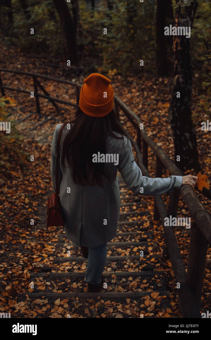 Girl walking alone rear view hi-res stock photography and images - Alamy