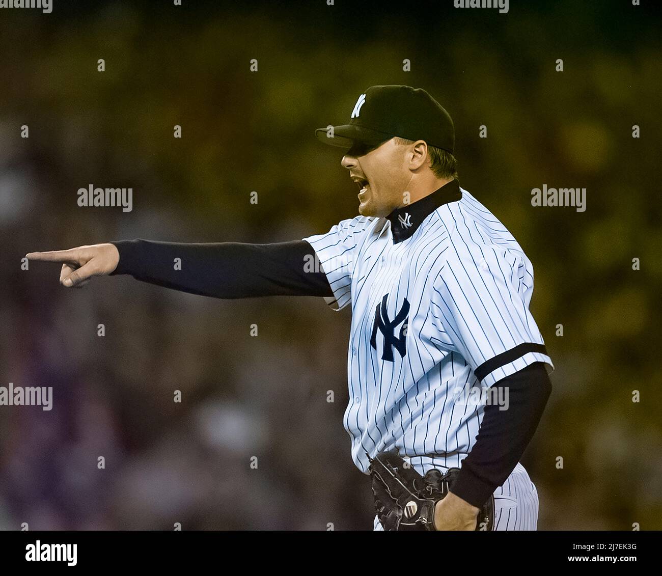 Yankees pitcher Roger Clemens points during a game against the Boston Red Sox on May 28, 2000 in New York. Photo credit: Francis Specker Stock Photo